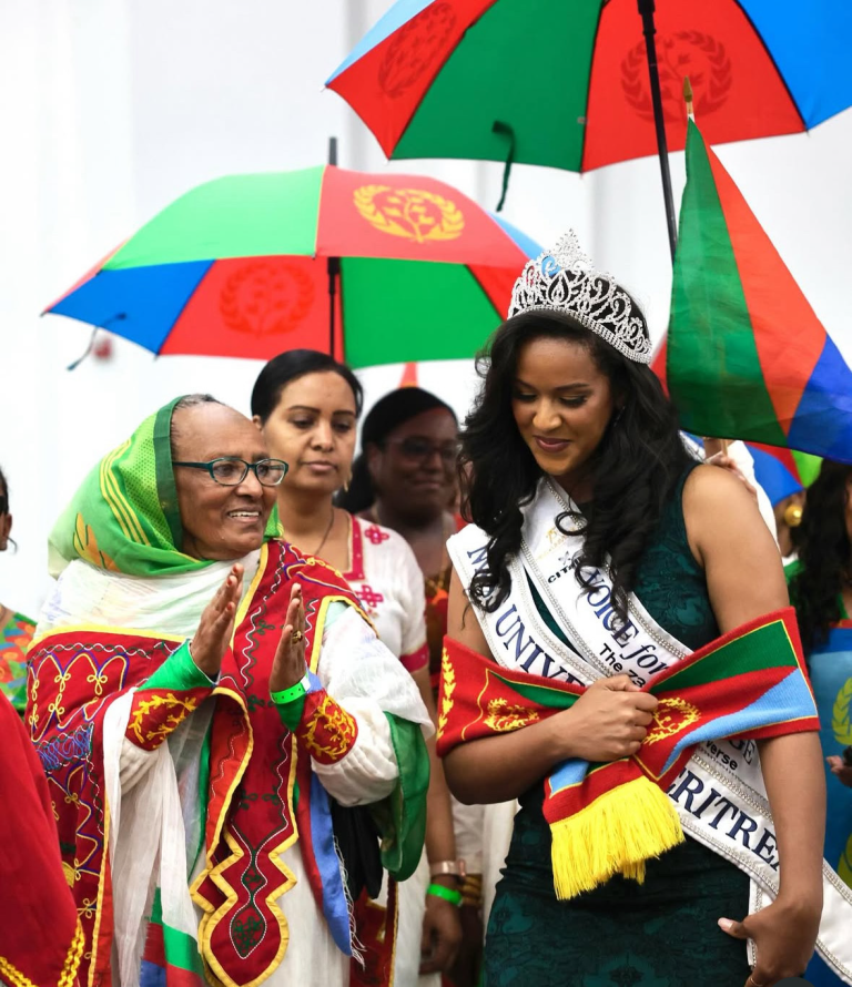 hawelti's tweet photo. Profile Q & A - Returning Home: Sinit Habteab on Culture, Purpose, and Eritrean Pride; by Sabrina Solomon

(Sinit Habteab is an Eritrean neuroscientist, Montessori educator, disability rights advocate, and global pageantry pioneer. Born and raised in Asmara before moving to the United States in 2019, she earned her degree in Neuroscience from George Mason University while actively conducting research in neuropsychological testing and early childhood development. Inspired by her younger sister, who has Down syndrome, and in memory of her late mother, Sinit founded “Designing for Diversity,” a non-profit initiative dedicated to dismantling educational barriers for neurodivergent children and integrating students with special needs into mainstream classrooms. A former Miss Africa USA titleholder, she continues to bridge scientific knowledge and grassroots humanitarian action).

*"...Coming back here has been profoundly meaningful, even for a short visit....Beyond my mission, I truly missed the simple joys of Asmara - especially our local pastry shops. Even after traveling across the United States and Europe, nothing compares to what we have here. I also missed the peaceful rhythm of daily life and the ability to connect more deeply with my community. That sense of identity guided me even during my pageantry auditions. During Miss Universe, for example, I chose to wear a burkini rather than a swimsuit to honor the morals and values I was raised with. Returning home reinforces those choices by deepening my bond with our people. As I prepare for my next competition, there is no better feeling than connecting with my roots and representing our community authentically".

*"...I certainly do not claim to be the most beautiful woman in Eritrea - our country is filled with extraordinary beauty - but being among the first to represent our nation internationally is something I treasure. On a global stage, I view myself as a small window through which the world can glimpse the true spirit of Eritrea. Carrying our flag and wearing traditional attire offered international audiences something fresh and unique. For our people, seeing our flag displayed with pride meant everything, and I felt that deep emotional weight as I waved it".

 *"... To young women, I encourage you not merely to model for outside brands, but to become ambassadors for your own values, identity, and country. Stand firmly in who you are so you can look back years from now with complete pride in the path you walked. To our scholars and professionals, keep striving for excellence and setting high standards, while always finding ways to share your expertise back home".