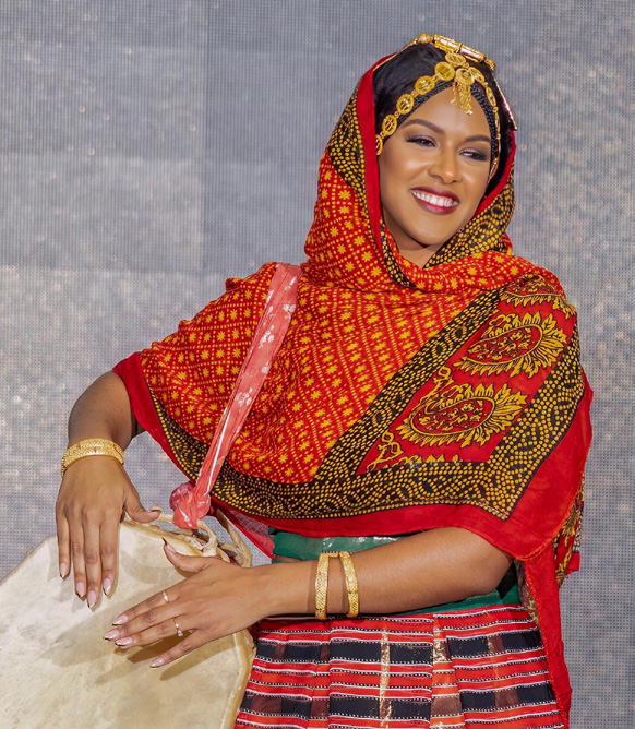 hawelti's tweet photo. Profile Q & A - Returning Home: Sinit Habteab on Culture, Purpose, and Eritrean Pride; by Sabrina Solomon

(Sinit Habteab is an Eritrean neuroscientist, Montessori educator, disability rights advocate, and global pageantry pioneer. Born and raised in Asmara before moving to the United States in 2019, she earned her degree in Neuroscience from George Mason University while actively conducting research in neuropsychological testing and early childhood development. Inspired by her younger sister, who has Down syndrome, and in memory of her late mother, Sinit founded “Designing for Diversity,” a non-profit initiative dedicated to dismantling educational barriers for neurodivergent children and integrating students with special needs into mainstream classrooms. A former Miss Africa USA titleholder, she continues to bridge scientific knowledge and grassroots humanitarian action).

*"...Coming back here has been profoundly meaningful, even for a short visit....Beyond my mission, I truly missed the simple joys of Asmara - especially our local pastry shops. Even after traveling across the United States and Europe, nothing compares to what we have here. I also missed the peaceful rhythm of daily life and the ability to connect more deeply with my community. That sense of identity guided me even during my pageantry auditions. During Miss Universe, for example, I chose to wear a burkini rather than a swimsuit to honor the morals and values I was raised with. Returning home reinforces those choices by deepening my bond with our people. As I prepare for my next competition, there is no better feeling than connecting with my roots and representing our community authentically".

*"...I certainly do not claim to be the most beautiful woman in Eritrea - our country is filled with extraordinary beauty - but being among the first to represent our nation internationally is something I treasure. On a global stage, I view myself as a small window through which the world can glimpse the true spirit of Eritrea. Carrying our flag and wearing traditional attire offered international audiences something fresh and unique. For our people, seeing our flag displayed with pride meant everything, and I felt that deep emotional weight as I waved it".

 *"... To young women, I encourage you not merely to model for outside brands, but to become ambassadors for your own values, identity, and country. Stand firmly in who you are so you can look back years from now with complete pride in the path you walked. To our scholars and professionals, keep striving for excellence and setting high standards, while always finding ways to share your expertise back home".