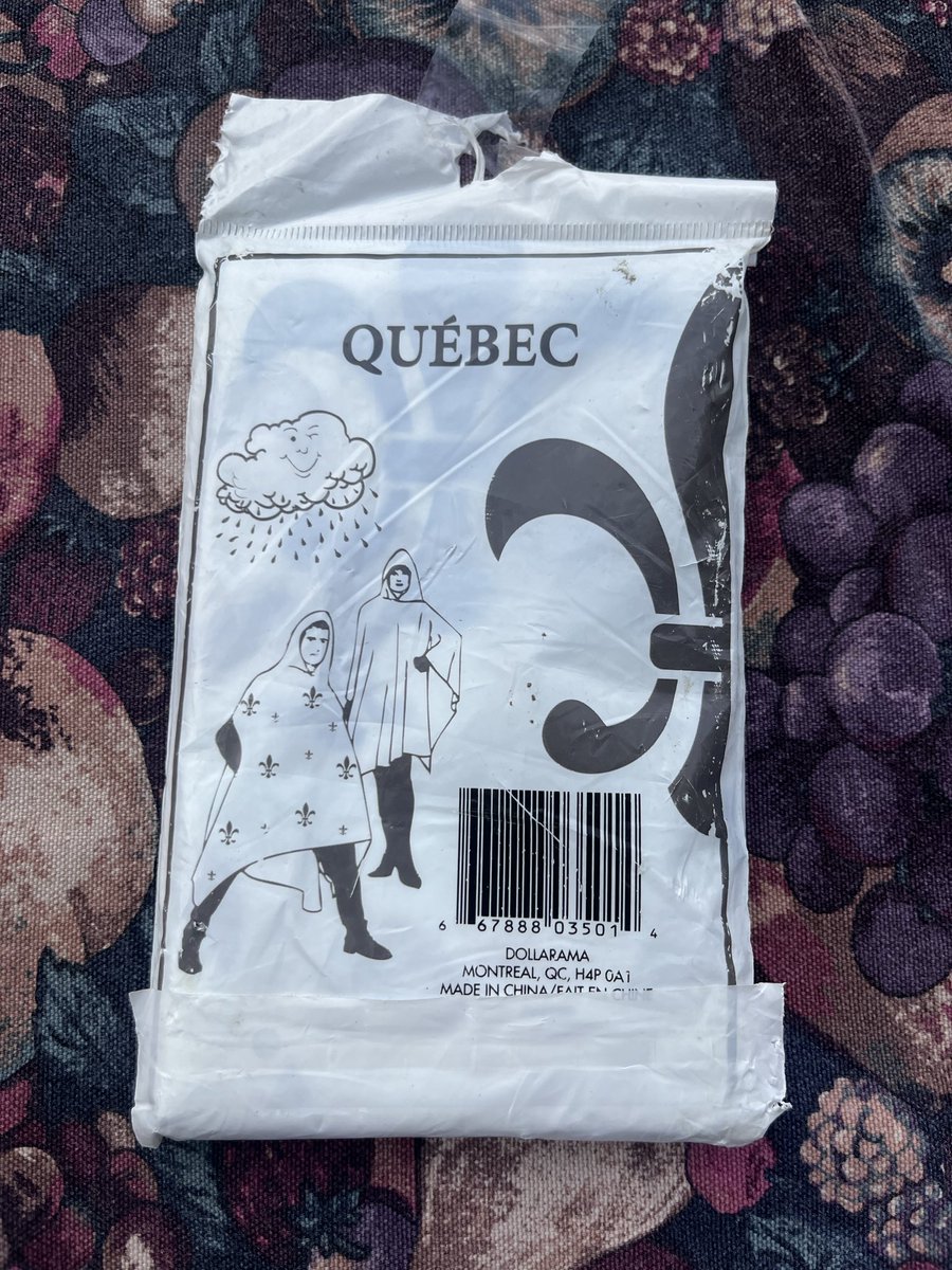 redroomrantings's tweet photo. Amazing graphic design on Quebec dollar store poncho https://t.co/8tjyuxhK17