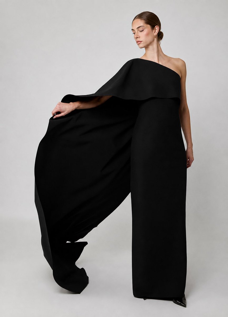 WhatMeghanWore's tweet photo. The Duke and Duchess of Sussex supported their friends David & Katharine Foster as David celebrated 40 years of fundraising for the David Foster Foundation. The festivities included a gala on Friday, August 7, followed by a concert at Victoria’s Inner Harbour the next day.

For the occasion, Meghan wore a new gown by Canadian designer Greta Constantine — the Fall 2026 Fabrizio Gown — paired with Princess Diana’s diamond butterfly earrings. 🦋

#MeghanMarkle
#WhatMeghanWore