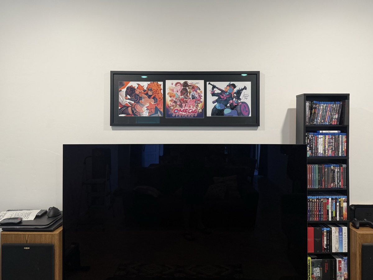 orangeandblack6's tweet photo. Finally got my Omega Strikers signed art collection together! Big thanks to @liyart_ for the art book and the prints, @JamesLandino for the signed album cover, @annejyatco and @SimplyAllegra for the signatures on their characters, and @PlayOmega and @OdysseyStudio for the game. https://t.co/MzXqpN8KYa