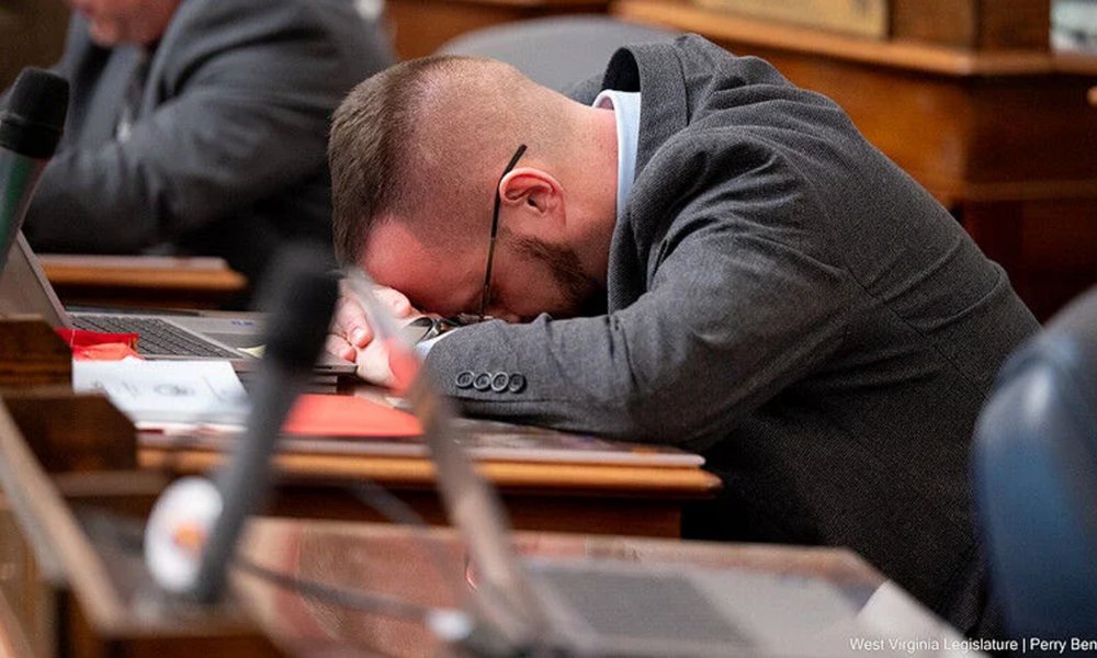 DougWahl1's tweet photo. HERE'S SOMETHING YOU MAY HAVE MISSED

Elliot Pritt is a  GOP state legislator in West Virginia. The first image shows him being sworn in. He campaigned on protecting children from the LGBTQ community.

The 2nd image was taken after Pritt was charged with enticement of a minor. https://t.co/a43AG0Afs3