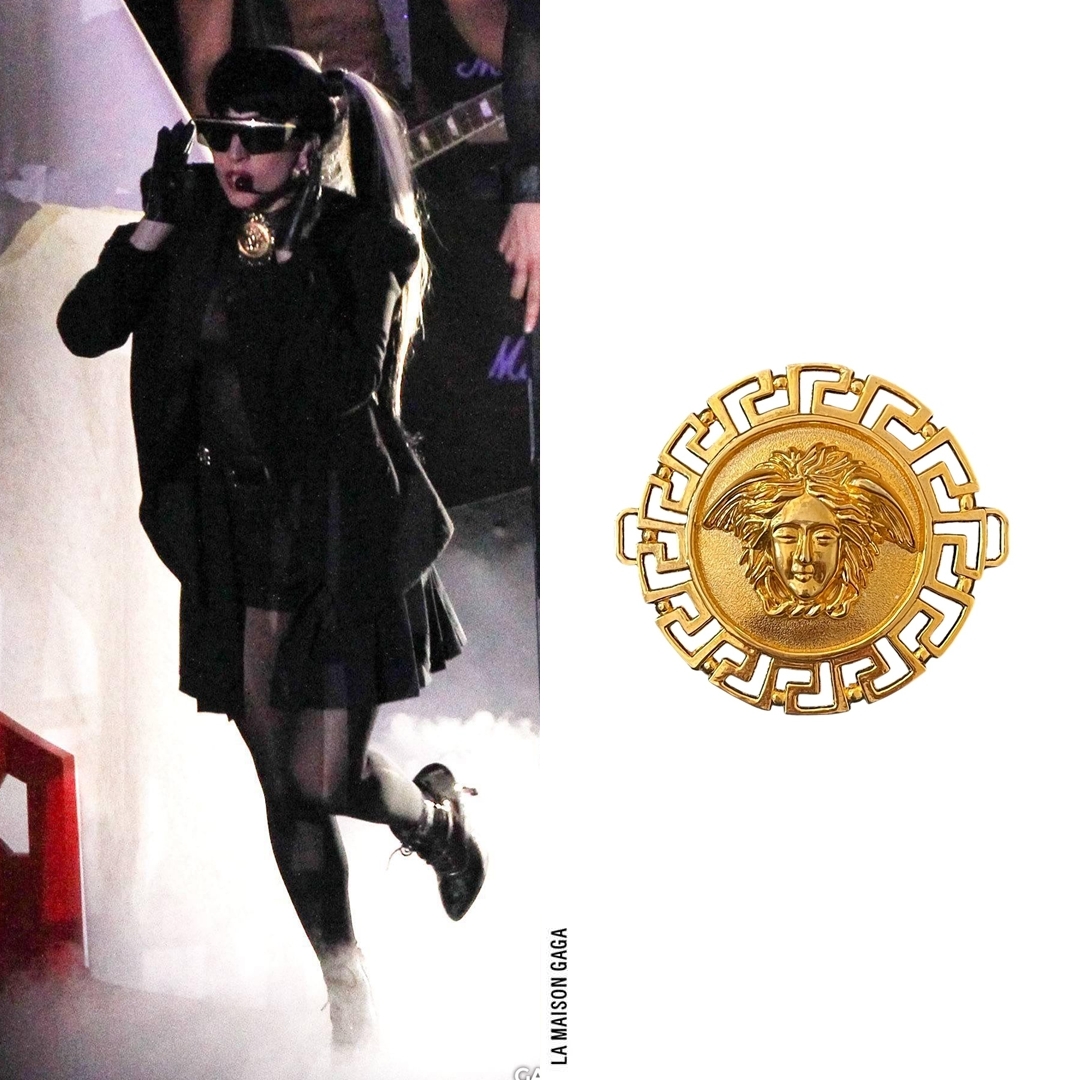 lamaisongaga_'s tweet photo. Lady Gaga performed at Taiwan Lantern Festival in a vintage @Versace black blazer paired with vintage @Versace "T76" shades and bag charm on her neck, and vintage @Chanel patent crocodile belt. Latex gloves by #VoidofCourse and booties by @PleaserShoes. https://t.co/PVHwWuLFJB