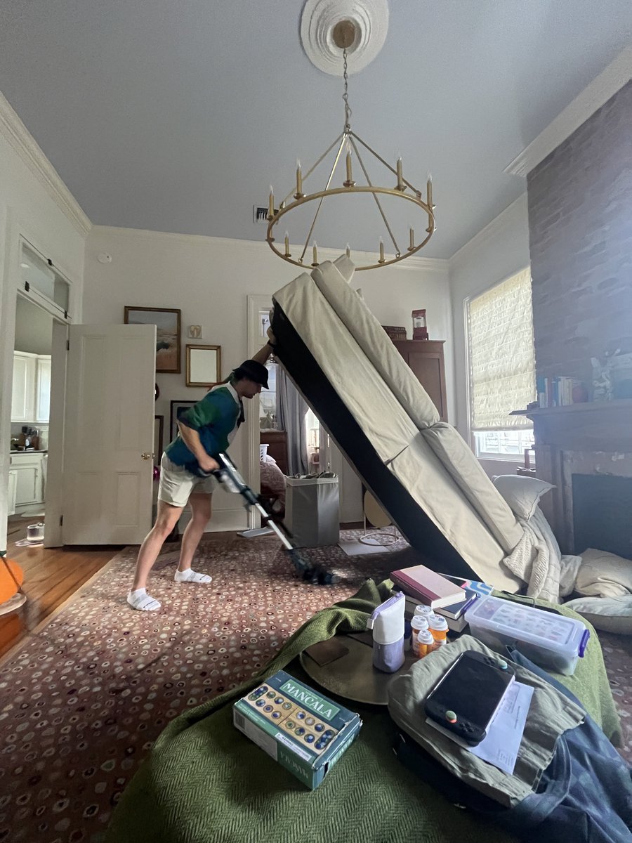 huggopeacelove's tweet photo. My brother lifted up our friend’s heavy ass couch so I could look for my airpods and then they took the opportunity to vacuum which resulted in the hardest pictures ever https://t.co/X6qdwdjWac