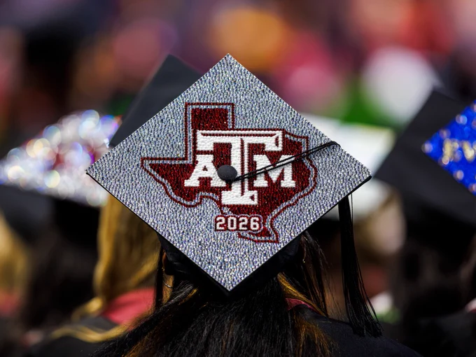 A decorated graduation cap featuring the Texas A&M University logo over a map of Texas with the year "2026" displayed prominently.