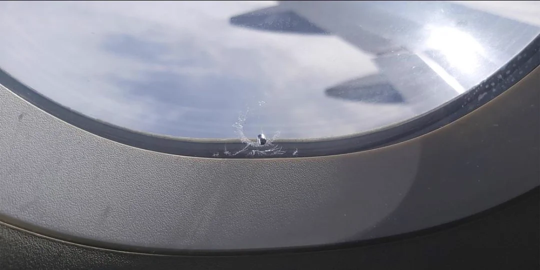 hole in airplane windows