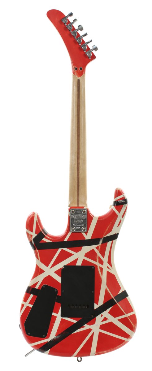 gguworld's tweet photo. A Kramer that Eddie Van Halen used in the studio, with his actual cigarette butts still wedged under the strings, just sold at auction for $170,000.

It was the first guitar his tech Zeke Clark ever built for him, from the 5150 era. https://t.co/xmQdUAZDYW