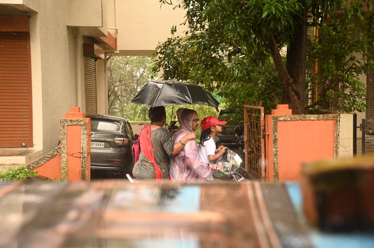 deep_nair16's tweet photo. People commute during heavy monsoon rains in outskirts of Mumbai India, on August 8, 2026. 
#rain #India #Monsoon https://t.co/gOnExytPiZ