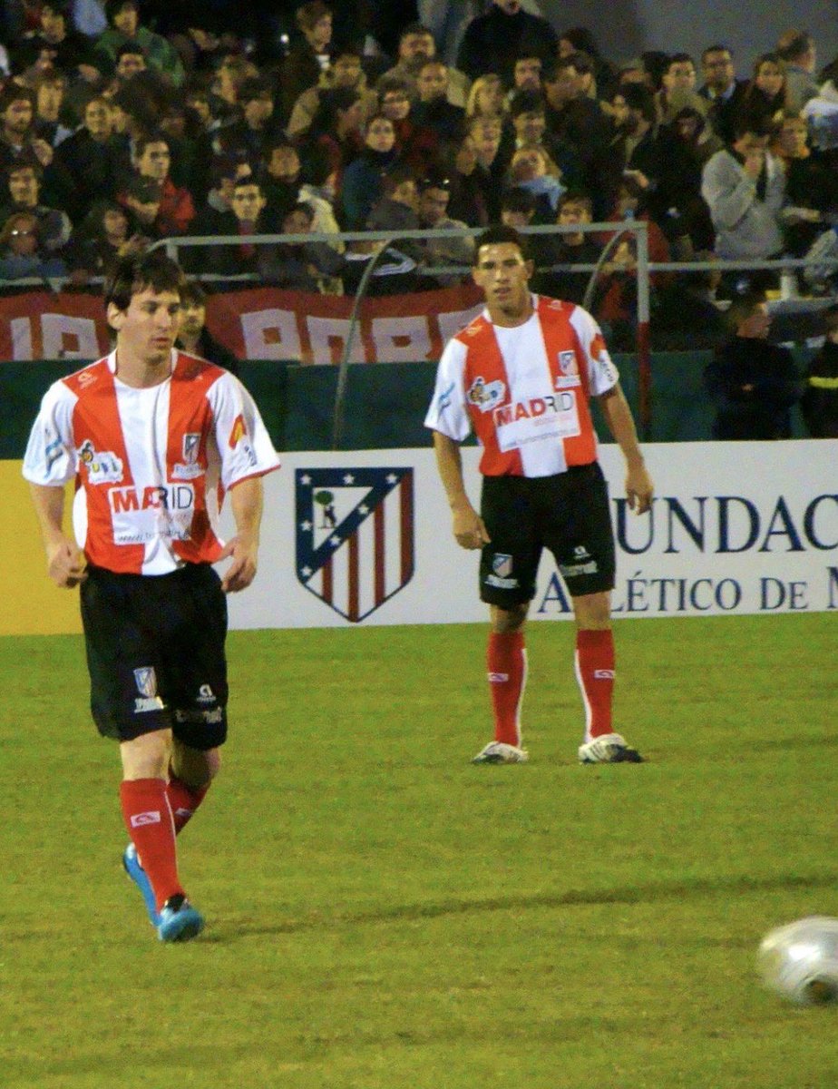 Barca_Archive's tweet photo. Lionel Messi, in Atletico Madrid shirt, 2009. https://t.co/eJxiuvrKY8