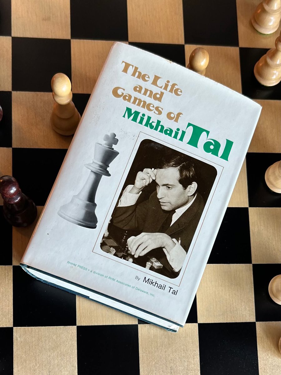 Suleimanthoya's tweet photo. A 519-page conversation with the “Magician from Riga.”

Published in 1976 by RHM Press, The Life and Games of Mikhail Tal remains one of the defining Mikhail Tal chess books.

This hardcover belongs to the original 1976 RHM Press edition. Sidney Fried is credited as publisher, David Levy as editor, and library records credit Kenneth P. Neat as the English translator and contributor. 

The publisher’s foreword preserves a wonderful anecdote about the book’s creation. RHM approached Tal with the idea of an autobiography. He readily agreed and, according to Fried, completed his lively career account in only a few months, illustrating it with almost 100 positions. 

The finished volume also presented 100 of Tal’s finest games, each annotated in depth by Tal himself.

The opening pages offer another charming glimpse of 1970s chess publishing. Readers who wanted news about future RHM books were instructed to mail a postcard to New York or London. 

The same pages promoted an opening survey developed with an editorial board that included Anatoly Karpov, Viktor Korchnoi, Boris Spassky, Tigran Petrosian, Svetozar Gligorić, and Bent Larsen.

Tal’s humor, honesty, and unmistakable personality give this classic its enduring appeal. Readers encounter the imagination behind one of the most celebrated careers in Soviet chess history.

#chessbooks #chess #chesshistory #latvija #historylovers