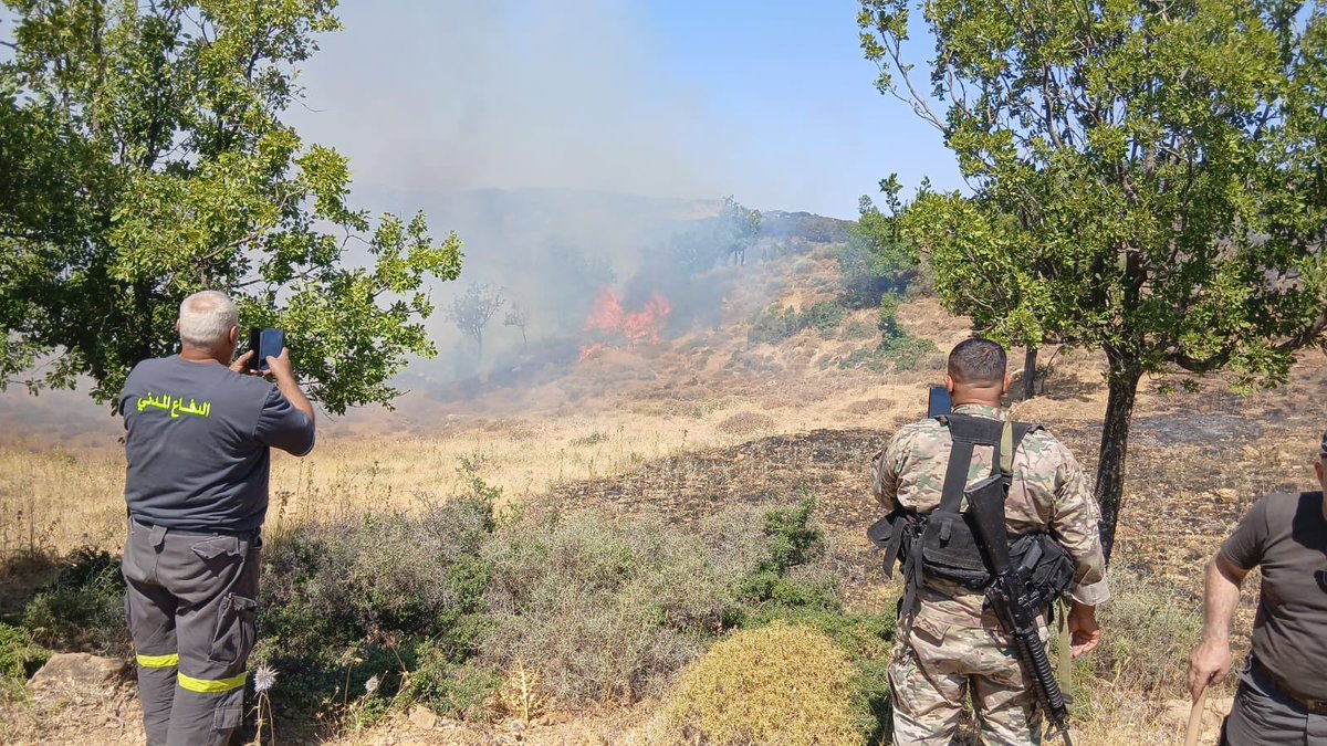 cbonneauimages's tweet photo. The Israeli army today dropped incendiary devices to start fires in Ain al Tineh, and they’re pictured here ripping up the land with tanks in Zowtar Al Sharqia. https://t.co/CC9H7WU5ud