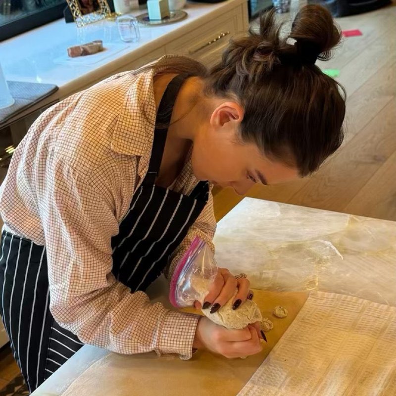 hailbishova's tweet photo. this picture of Hailee cheffing it up reminded me of this picture of Florence as Chef Almut in WLIT 😭

striped apron, hairstyle, and everything https://t.co/YCLp1WA38I