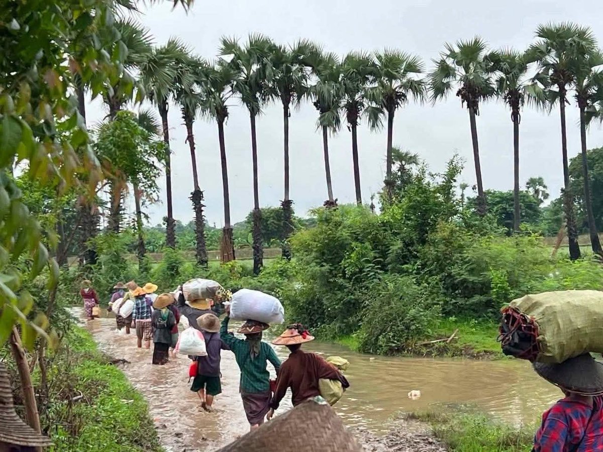 TheChindwin's tweet photo. Thousands of citizens are currently stranded in Sagaing Division due to unprecedented flooding in the region, which has caused many villages to become submerged and compelled residents to evacuate to higher ground in northwestern Myanmar.

There is an urgent necessity for food and essential aid, prompting local anti-junta resistance groups and grassroots committees to initiate fundraising campaigns aimed at assisting those severely impacted by the ongoing flooding.

The junta regime has been notably lax in providing humanitarian assistance to regions where it faces challenges in maintaining control or is experiencing a loss of influence. 

This deliberate disregard for the needs of affected populations is deeply concerning and exacerbates the crisis faced by these communities.

Photo/Ye-U Freedrom Comrades