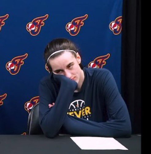 Outkick's tweet photo. Caitlin Clark is all of us hearing her coach defend DiJonai Carrington https://t.co/0DP8HVBub3