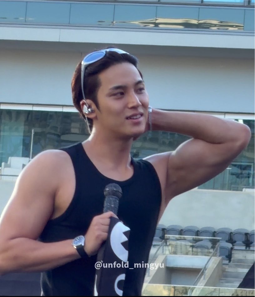 gyustarlit's tweet photo. barefaced mingyu + tanned skin + biceps out + pushing his hair back with glasses = deadly combo https://t.co/BdD1hi77mh