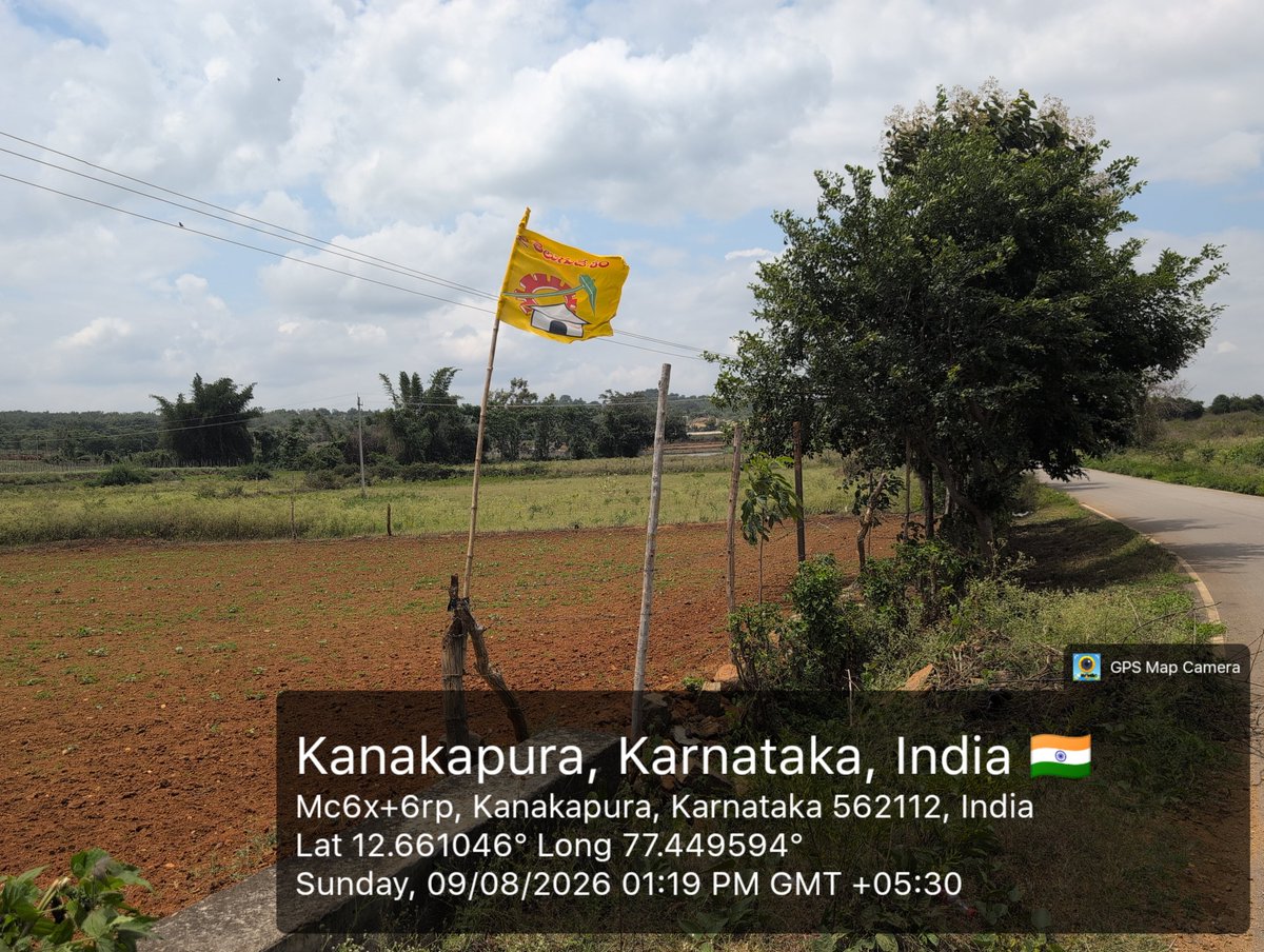 SagarP116's tweet photo. While our biking group was riding through rural Karnataka this morning, something unexpectedly caught my eye Telugu Desam Party flag! 
 As a Telugu person, seeing the TDP flag here, so far from Andhra Pradesh, was truly surprising ...

@JaiTDP @ncbn @naralokesh https://t.co/n5SyzrfEul