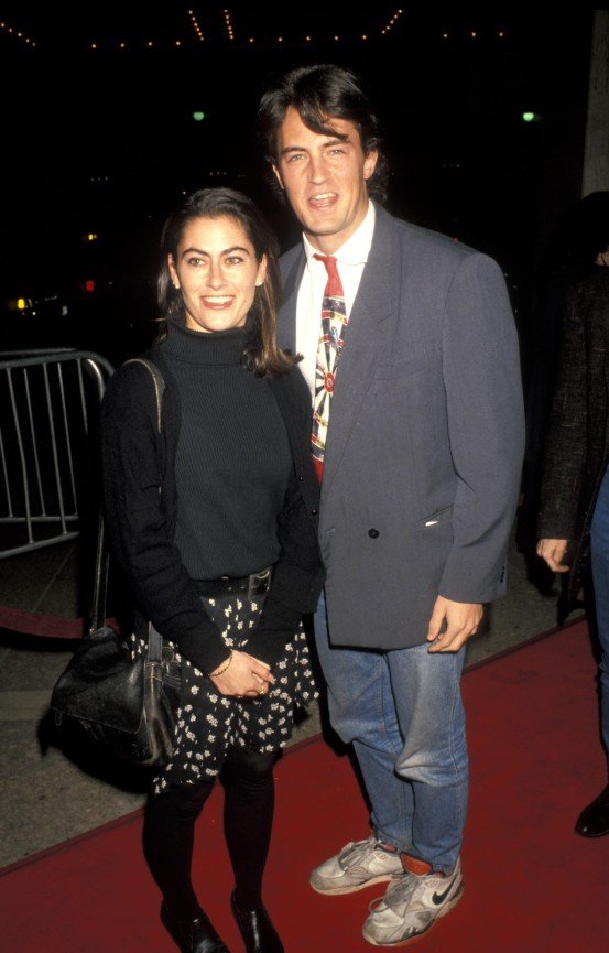Dilotos's tweet photo. Can we take a moment for this 1991 throwback? Matthew Perry and Roxana Zal hit the red carpet for 'Class Action' at the Plitt Theater in Century City. Simpler times. 🤍🎞️ #MatthewPerry #Friends #90s https://t.co/N14thrOOi9
