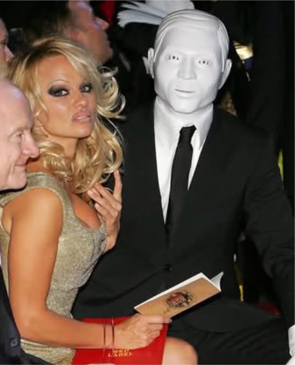 creepydotorg's tweet photo. Pamela Anderson appeared at a London fashion show in 2008 alongside a mysterious masked companion. 

Many believed the person was Michael Jackson in disguise. https://t.co/1UjhOHgjjB