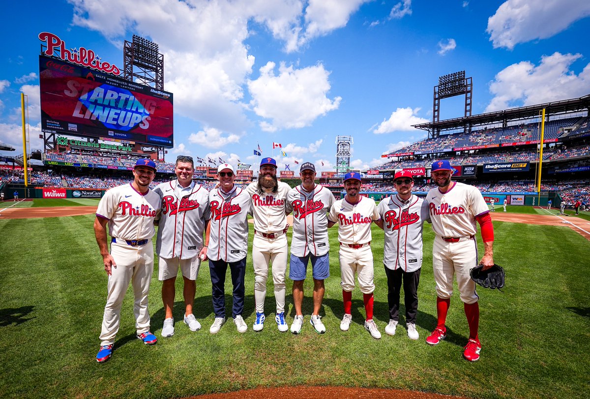 Phillies's tweet photo. Ahead of our upcoming MLB at Field of Dreams Game, Phillies alumni Tim Gradoville, Tim Lahey, Jeff Singer and Will Toffey threw out the ceremonial first pitch. 

Similar to the memorable Moonlight Graham storyline from the iconic film, the four reached the major leagues, wore a Phillies uniform and were on the club’s active roster, but never appeared in a regular season game.