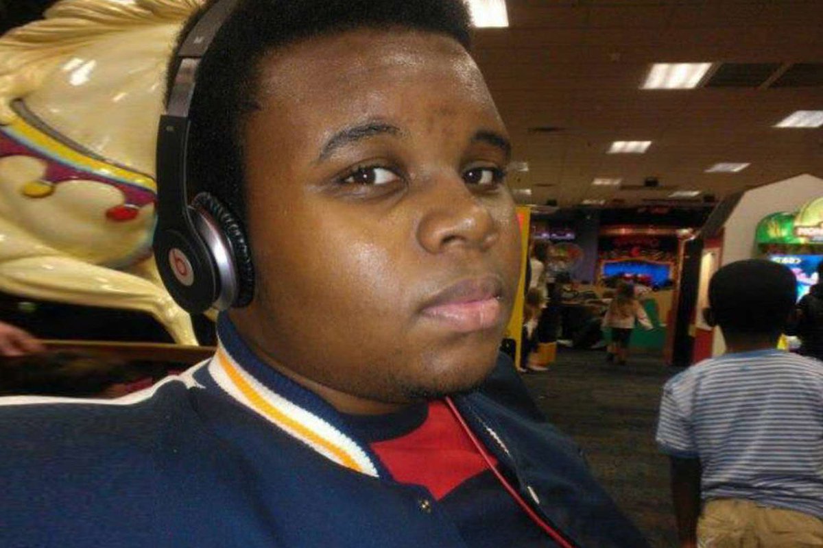 FoxyMarxist's tweet photo. Old photos of Michael Brown, who was killed on this day  by a kkkop in Ferguson in 2014. https://t.co/7YQQwH8gPm