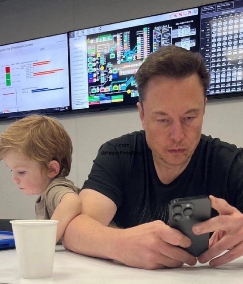 CommReeveMn6's tweet photo. What do you think Elon Musk is looking at on his phone? 📱🤔

A. AI updates 🧠
B. Tesla production data 📊
C. X notifications 📱
D. SpaceX mission updates 🚀 https://t.co/W8b5FBXAEG