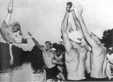 CalBearsHistory's tweet photo. On August 9, 1948, Cal Men's Varsity 8, representing the USA, won Gold at the London Olympics, the third Gold Medal in 4 Olympics for @CalMRowing and legendary coach Ky Ebright. Below: following tradition, the team celebrates by throwing coxswain Ralph Purchase into the Thames. https://t.co/WAwD5kroR1
