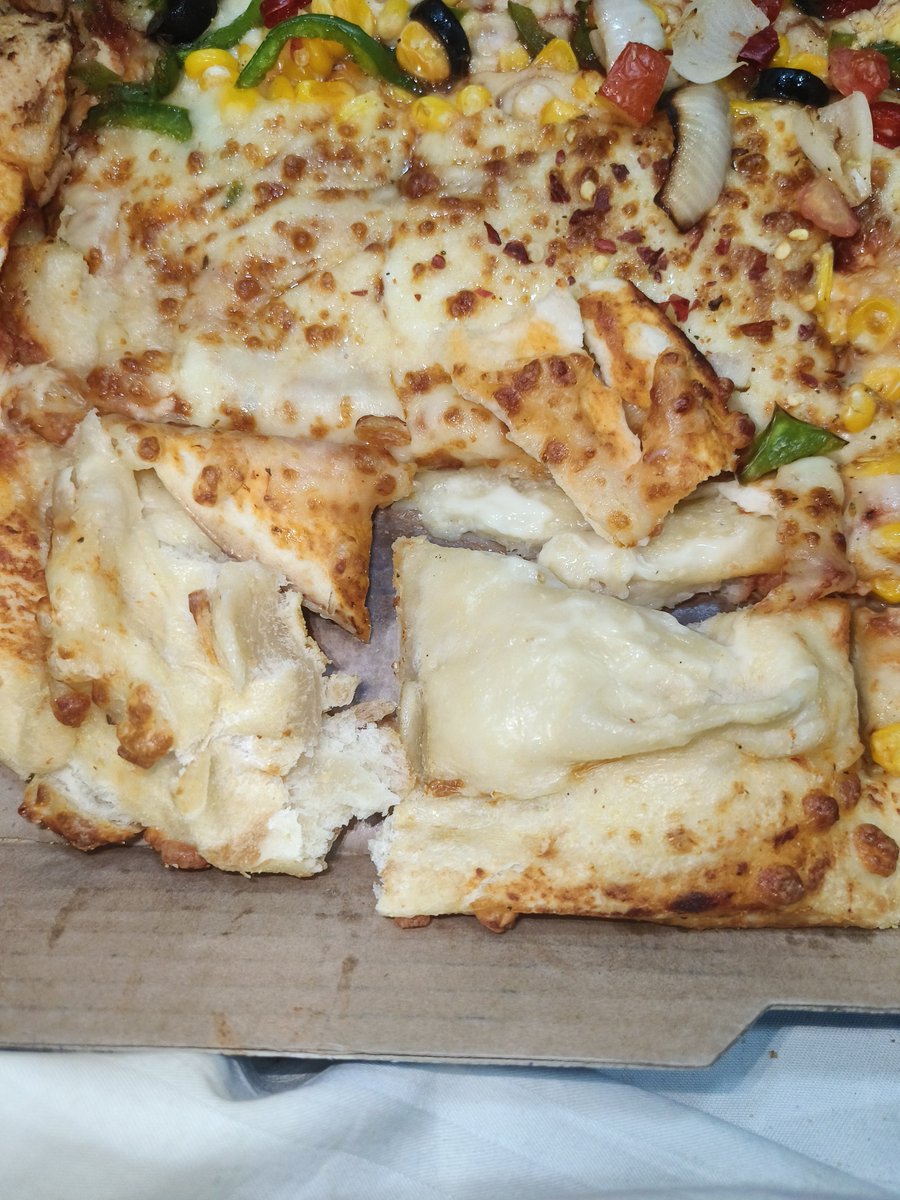 Ftxex1's tweet photo. @dominos @dominos_india The pizza delivered to me was raw/undercooked and had a foul smell, making it unsafe to eat. Photos attached as proof. Please arrange a full refund/replacement and investigate this food safety issue urgently. https://t.co/ak5aXM2762