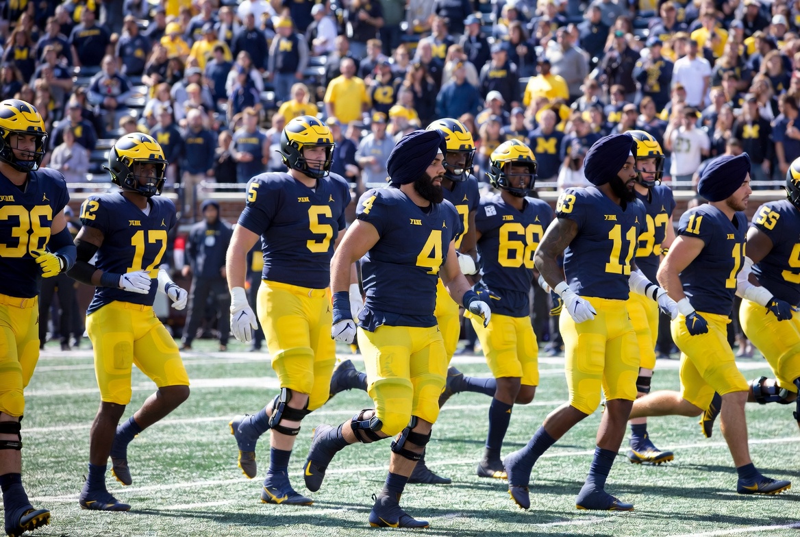 stoptaxingme2's tweet photo. @RealHousewifeMi Made with AI. Wait till this Michigan team plays THE Ohio State https://t.co/Yn2SzMxDMe