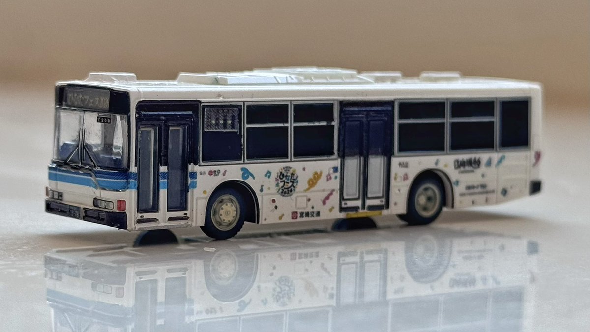 nibukotsu's tweet photo. “ひなたフェス×宮崎交通ラッピングバス”を作ってみました〜🚌
X等でUPされている写真を参考にさせて頂きました。
粗いところもあるけど、雰囲気は出てるんじゃないかな？
ひなたフェス楽しみですね〜🌴
#ひなたフェス2026
#日向坂46 #宮崎交通 https://t.co/Hu17N29Oua