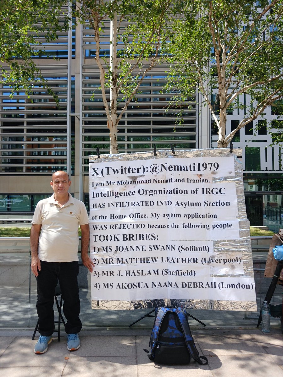 Nemati1979's tweet photo. I’ve been PROTESTING in front of office of Home Secretary because my asylum claim was REJECTED, despite I’m at risk of EXECUTION for meeting with a CIA officer at US Embassy in New Delhi; an act that Iran regime considers crime of ESPIONAGE and COMMUNICATION WITH A HOSTILE STATE https://t.co/Ry8fq5EpMa