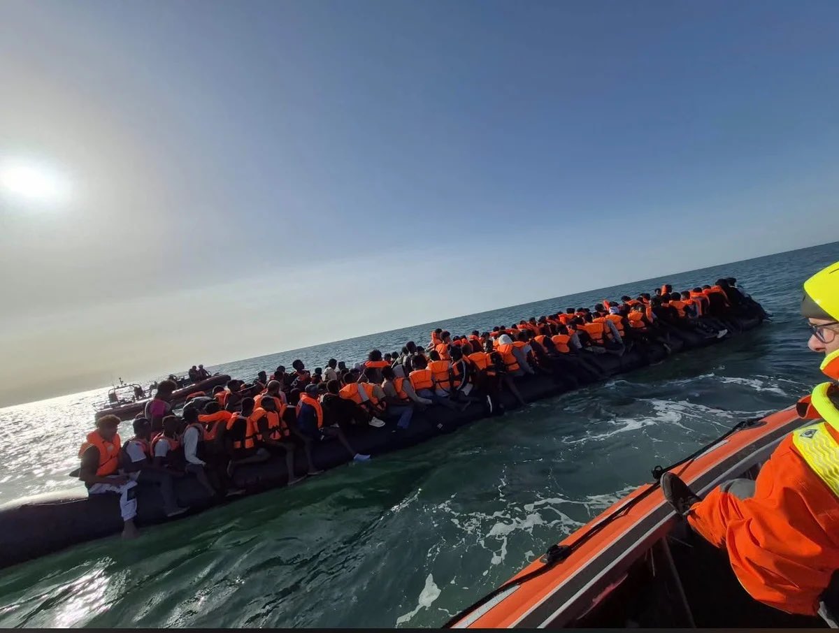 Alexarmstrong's tweet photo. That is not a “small boat”. 

230 people in one go. Each one of them will need a home, benefits, NHS care, dental and everything else. We also haven’t got a clue who they are. https://t.co/29RygI77Hw