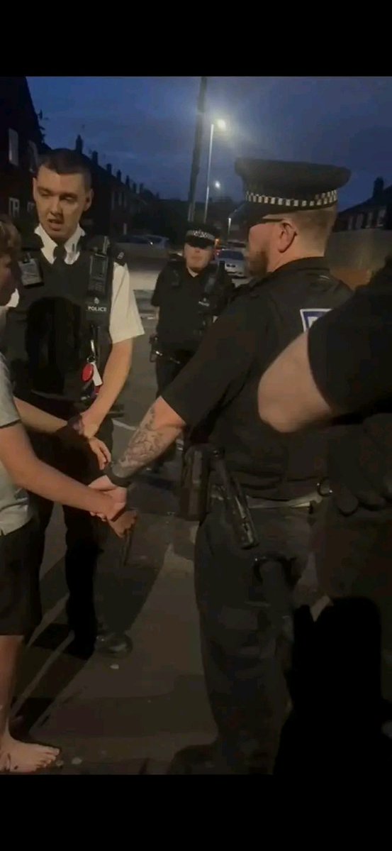 FreyjaBakke's tweet photo. 🤬🤬🤬A 12 year old child was arrested by #Merseyside #Police in #Netherton on 27th July 2026 after a phone call was made to Police with a false report of a burglary.

The 12 year old child and his family who are Polish, have lived in their house for six years. A few months ago a Nigerian family who have just moved to the UK were allocated a house in the street.  The family were very hospitable with them, supported them and offered them food.

One of their children, a 13 year old we will call Sean, began entering the family’s home and took things that did not belong to him the child’s father claims.

Despite this the family continued to allow Sean to come to their home and play with their children.

On 26th July 2026, the family went Alton Towers for the 12 year old child’s birthday and they took Sean with them. On the way home they stopped at the services. 

When they continued their journey, Sean revealed that he had stole some sweets and chewing gum.

 The 12 year old child’s father was not happy with this and told Sean never to come to his house again.

The next day, Sean and his mother came to the family’s house and accused the father of racist discrimination. The father again told them to leave and not to come back. Thirty minutes later, Police Officer 1301 turned up.

The Officer would not let the 12 year old’s mum listen to what he was saying to her son, pushed her away a number of times and eventually handcuffed her.  

The 12 year old child was taken to the patrol car. He was barefoot. The officer refused to allow him to put on shoes or socks.

Additional police cars arrived at the scene, and ultimately, around 10–12 officers were involved in the intervention. British neighbours came out into the street to defend the Polish family. 

Finally, an armed police unit arrived. The officers were carrying firearms, even though children were present. "I didn't know what was going on. I was genuinely afraid during the incident” recalls the father.

The 12 year old child was taken away by Police with no information as to where he was being taken. His father tried to follow, but Police blocked his car. He then went with a neighbour in his car, but Police stopped that and did a full search of the vehicle.

According to his father, the 12 year old child said that one of the officers had twisted his arm. "The officer with badge number 1301 twisted my son’s  arm so hard that he broke his wrist.”

The father claims to possess several recordings documenting the entire course of the incident. 

“I have four other videos as well. I have every single second of the intervention recorded," he says. 

The family have instructed a Solicitor