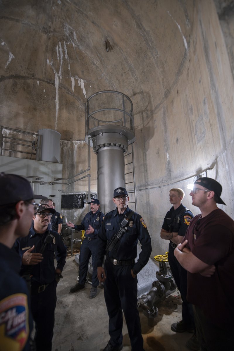 usbr's tweet photo. Preparedness starts with partnerships.
 
Recently, Bureau of Reclamation staff welcomed @CAL_FIRE and the Lewiston Fire Department for an in-depth tour of Trinity Dam, providing a firsthand look at the facility, its operations, and key access points. Building a shared understanding today helps ensure we're ready to work together if an emergency ever arises.
 
Strong partnerships and coordinated planning are essential to protecting critical infrastructure, our employees, and the communities we serve.

📷 1:  CalFire personnel look into a Turbine Pit as part of their tour of the Trinity Dam.
📷 2:  The inside of the tunnel system at Trinity Dam is complex so Reclamation staff ensure CalFire personnel know how to access hard to reach areas.
📷 3:  Deep inside Trinity Dam firefighters are given a tour by Reclamation staff.
📷 4:  CalFire and Lewiston Volunteer Fire Department personnel get a tour of Trinity Dam from Reclamation staff.