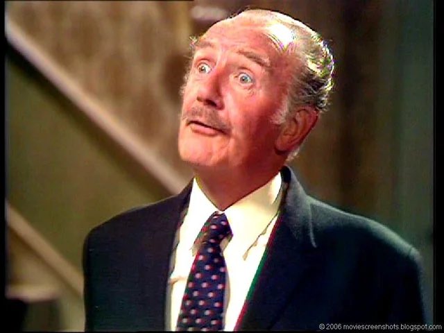 biscuitchomper's tweet photo. @ByDonkeys Major Gowan - Fawlty Towers. That blazer wasn’t cool even when it was cool. https://t.co/dlGMFILnXO