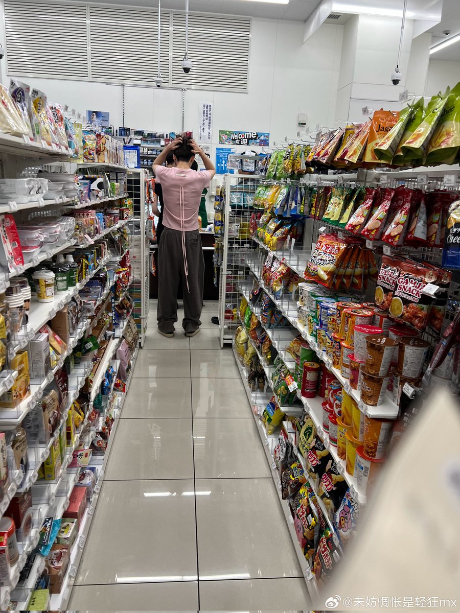 wonxinau's tweet photo. “i’ve been dying to say this, but i can finally talk about it now. so, we know that wonxin were roommates in yokohama. well, i happened to run into them at a convenience store on yokohama day 2 (i mean day 2 of the concert, not the “d2” in their vlog—in other words, not the day when everyone went out to film the vlog).

if i remember correctly, xinlong and arno were there too, so there were four of them in total. xinlong left relatively early, although i’m not 100% sure because i might have mistaken what i saw. arno was definitely there, though. the order in which they left the convenience store was roughly xinlong → arno → sangwon → anxin.

the important part is that sangwon was already standing by the checkout waiting when xinlong left. but after xinlong left, anxin continued browsing for less than five minutes, and sangwon still didn’t leave. when anxin went to check out, sangwon suddenly went to another register and checked out a second time. sangwon didn’t leave until anxin was almost finished paying. by that point, xinlong and arno had already been gone for a while.

at the time, i was really confused about why sangwon was taking so long and why he was paying twice… thinking about it now, maybe he was waiting for his roommate (his lover)…

the whole thing lasted around 8–10 minutes. to be honest, the four of them didn’t talk that much, but you could tell they were really comfortable with each other and had a very natural relationship. i LOVE this cline + ax and his husband little squad aaaaaaaa 😭😭 i also remember there was a time when someone said they had gone to the gym together before… you can really tell that sangwon has a genuinely good relationship with anxin, xinlong, and/or the people around anxin. 😭😭

one last thing: there were very few people inside the convenience store at the time, so i didn’t dare say anything. i only secretly took a few photos. i actually have a slightly closer photo of anxin, but since this was a private schedule, i’m only posting one photo from behind. (everyone recognizes this outfit, right?) for sangwon, i’ll post a side profile because he hasn’t worn this outfit in private before, so i was worried people might not recognize him.

also, they are seriously so legendary up close. i was starving that night, walked into the convenience store, and the moment i saw sangwon’s unbelievably gorgeous face, i genuinely thought i had passed out from hunger and ascended to heaven, because i thought i was hallucinating… 😭

and anxin’s eyes are especially big. his whole vibe is really easygoing, cute, and youthful. sangwon, by comparison, has a sharper aura. i definitely didn’t dare get too close to him lol.

(the last photo is proof that i’m not a sasaeng. i really was just there to attend the concert. maybe i only got lucky and ran into them because my hotel happened to be close to the venue…)

oh, one more thing i forgot to add: there were also two staff members with them—i remember there being two. they might have been managers, assistants, or translators/interpreters.”