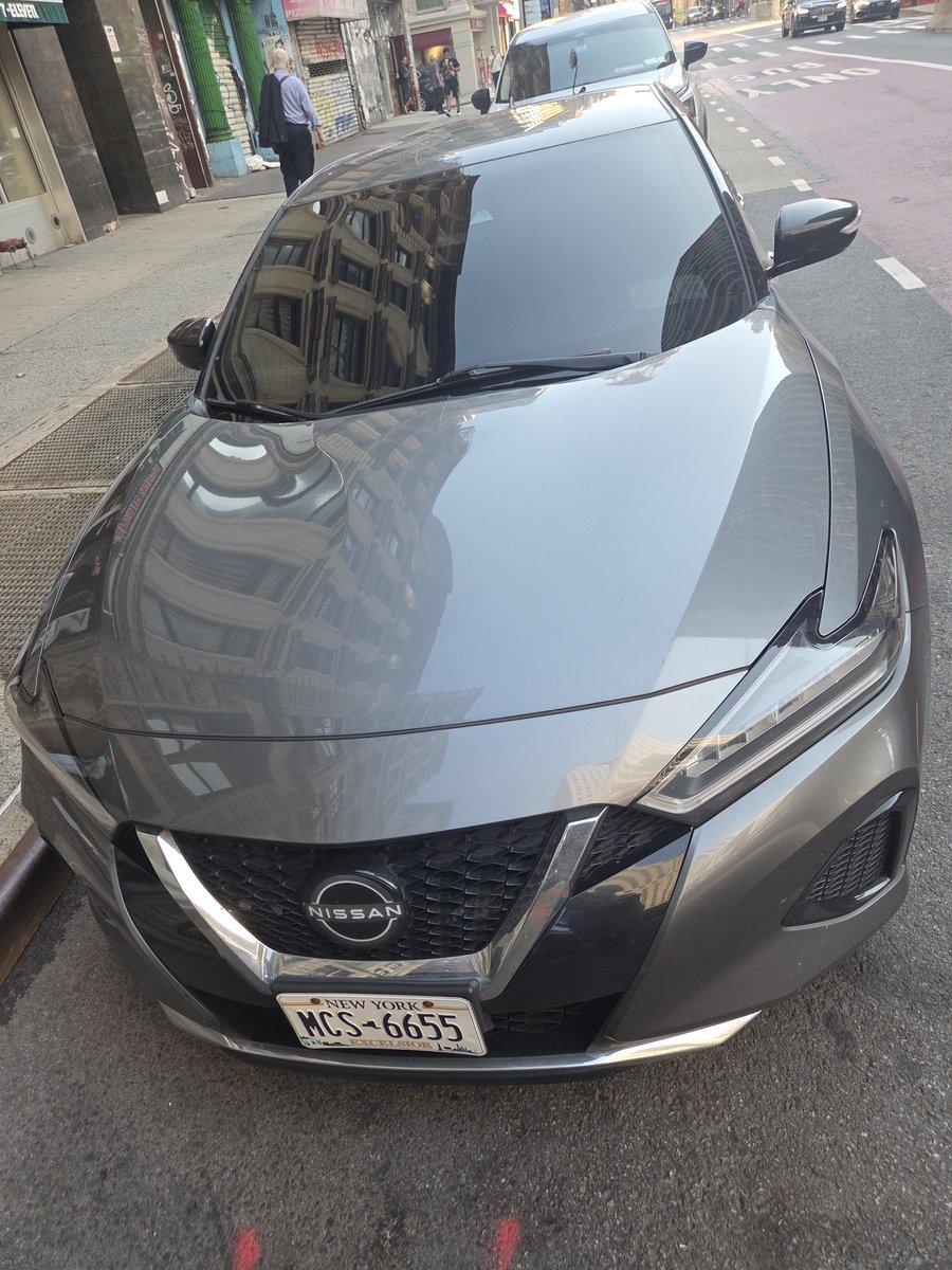 placardabuse's tweet photo. We wonder how this #GhostCar with an illegal license plate cover and illegally tinted windows was able to avoid detection by @NYPDPC's "ring of steel" camera system and then wasn't noticed by @NYPDTransport when it was parked illegally blocking the bus stop? https://t.co/9wbXTVCHls