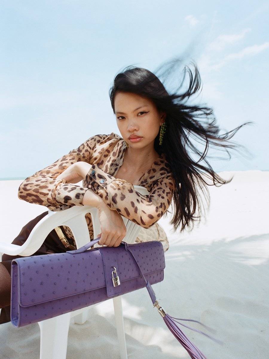 Fanciclub99's tweet photo. The primal meets the polished in an expression of modern femininity.

Featuring the Extended Ostrich Long Clutch &amp; Frame Silk Shirt.

Beachwear ‘26 Campaign, available now at https://t.co/hsGCRVU8Iv https://t.co/yzg5DRHwSw
