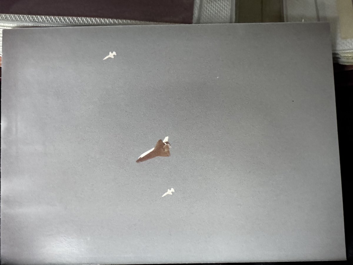 SpaceGeekSheri's tweet photo. YOU! GUYS!  This is an authentic actual photograph printed on photo paper that I found in my grandpa’s stuff! Is it a shuttle coming in?? https://t.co/41LOwlWJRW