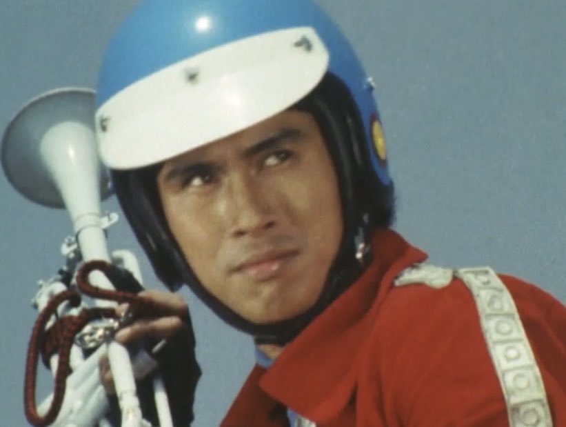 Felis4Man's tweet photo. @offfhandway It's a recurring thing in Kikaider series, where characters would make an entrance playing their instruments. Original Kikaider use a guitar, 01 use a trumpet, Bijinder use a harp, and Waruder use a flute. Hakaider is the only one without an instrument, so he just whistles. https://t.co/QrWrPTbX8o