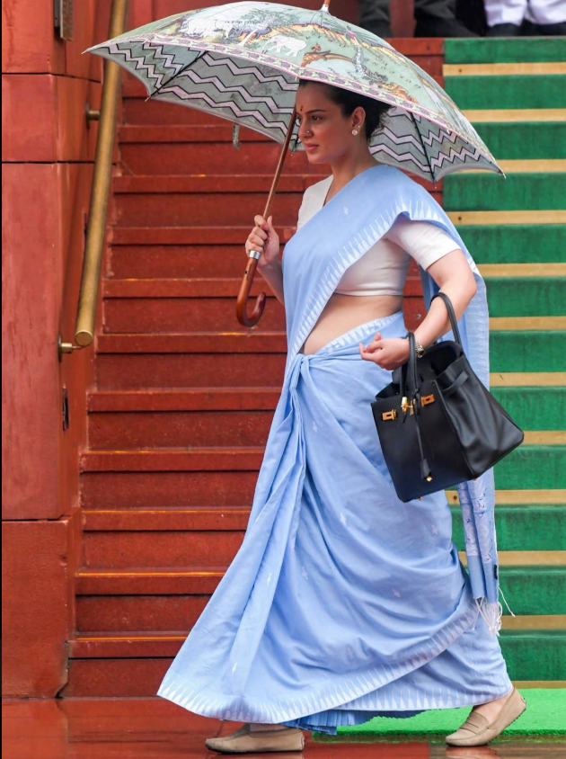 hindutva_anshu's tweet photo. Kangana Ranaut doing aura farming after cooking the entire Left in just two videos. 🔥 https://t.co/p0BnZFBbm3