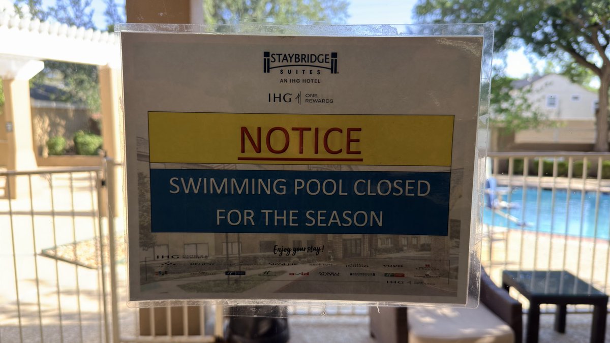 Xevious's tweet photo. How can the “Swimming Pool [be] Closed for the Season”when it’s 100℉ out‽ Does that mean it’ll open again September 21st? @IHGhotels https://t.co/yOnwaYqGVo