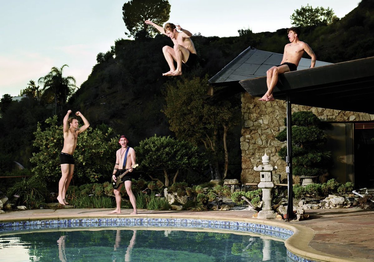 lesblurry's tweet photo. what’s up with homoerotic friends in a band engaging in weird activities around pools https://t.co/Q2XEBcxGUl