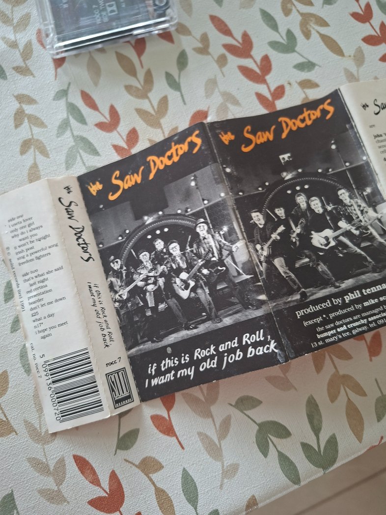 TirChonaillAbu's tweet photo. About a year ago the Saw Doctors played in Letterkenny.  They were brilliant.  Sad bastard that I am I brought my original cassette of their big album with me hoping to get them to sign it.  They all left immediately after the gig, no joy.  Spotted a lad in a lanyard.  Asked him if he could get the lads to sign it.  He said aye no bother but how will I get the tape back to you?  I asked him if he knew big Eamonn who works in the Toyota garage in Tuam.  

"Sure I knows Éamonn well, no bother".

Forgot about it.  

Thought it was gone forever.

A few days ago, txt message from cousin Éamonn in Tuam.  "I've a tape here for ya"...

This arrived today, signed by the lads.

Delighted.

Took a year, but it found me.