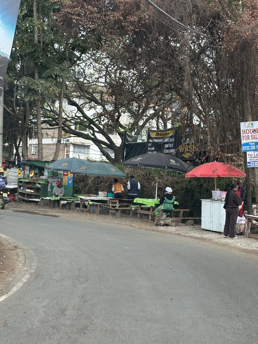 Alfayaz11's tweet photo. failures @ntsa, why are you arresting pedestrians only at selective places? Kindly come and arrest all these “low-life” people walking on Nairobi’s roads. Surely they should know by now that our great city is not meant for poor people or anyone who cannot afford a boda boda, an Uber or their own vehicle. Nairobi is clearly not for pedestrians.

I hope you are aware that my engineer brother @MuriraKinoti and his able team at @KURAroads, together with our world-class urban visionaries at @047County, have carefully designed Nairobi so that spaces meant for pedestrians can instead accommodate vibandas, boda bodas, Ubers, PSVs, parking bays, car washes with free sewage water generously provided for them, and food outlets.

So please, stop confusing people with selective enforcement. Either provide and protect proper pedestrian infrastructure across the city and enforce the law consistently, or simply announce that walking in Nairobi is now an offence reserved for those who cannot afford transport.

As usual the pictures in the thread
1/3

#ReclaimNairobi
