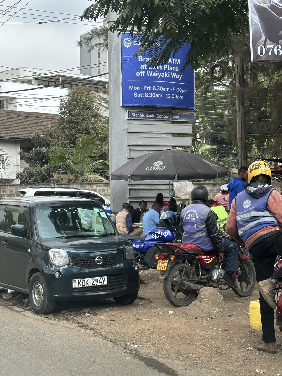 Alfayaz11's tweet photo. failures @ntsa, why are you arresting pedestrians only at selective places? Kindly come and arrest all these “low-life” people walking on Nairobi’s roads. Surely they should know by now that our great city is not meant for poor people or anyone who cannot afford a boda boda, an Uber or their own vehicle. Nairobi is clearly not for pedestrians.

I hope you are aware that my engineer brother @MuriraKinoti and his able team at @KURAroads, together with our world-class urban visionaries at @047County, have carefully designed Nairobi so that spaces meant for pedestrians can instead accommodate vibandas, boda bodas, Ubers, PSVs, parking bays, car washes with free sewage water generously provided for them, and food outlets.

So please, stop confusing people with selective enforcement. Either provide and protect proper pedestrian infrastructure across the city and enforce the law consistently, or simply announce that walking in Nairobi is now an offence reserved for those who cannot afford transport.

As usual the pictures in the thread
1/3

#ReclaimNairobi