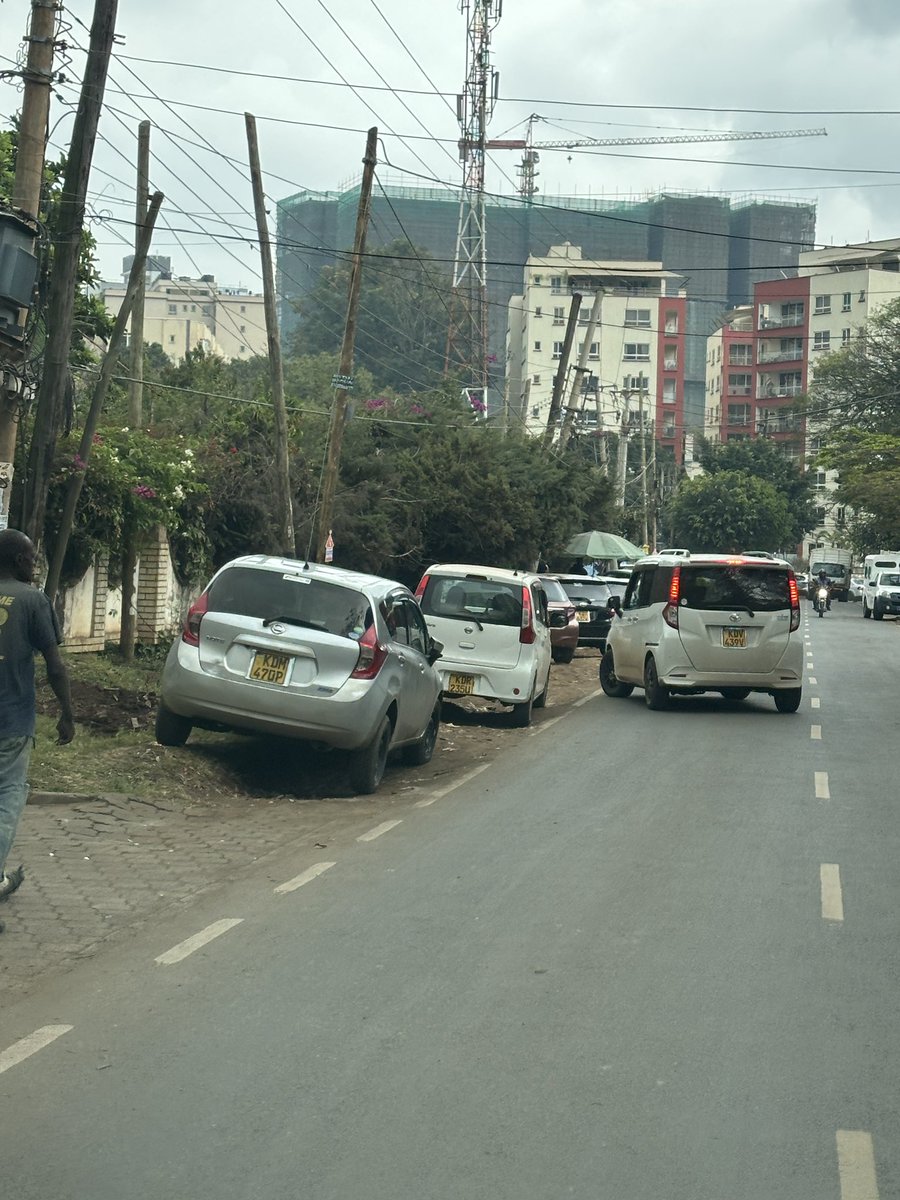 Alfayaz11's tweet photo. failures @ntsa, why are you arresting pedestrians only at selective places? Kindly come and arrest all these “low-life” people walking on Nairobi’s roads. Surely they should know by now that our great city is not meant for poor people or anyone who cannot afford a boda boda, an Uber or their own vehicle. Nairobi is clearly not for pedestrians.

I hope you are aware that my engineer brother @MuriraKinoti and his able team at @KURAroads, together with our world-class urban visionaries at @047County, have carefully designed Nairobi so that spaces meant for pedestrians can instead accommodate vibandas, boda bodas, Ubers, PSVs, parking bays, car washes with free sewage water generously provided for them, and food outlets.

So please, stop confusing people with selective enforcement. Either provide and protect proper pedestrian infrastructure across the city and enforce the law consistently, or simply announce that walking in Nairobi is now an offence reserved for those who cannot afford transport.

As usual the pictures in the thread
1/3

#ReclaimNairobi