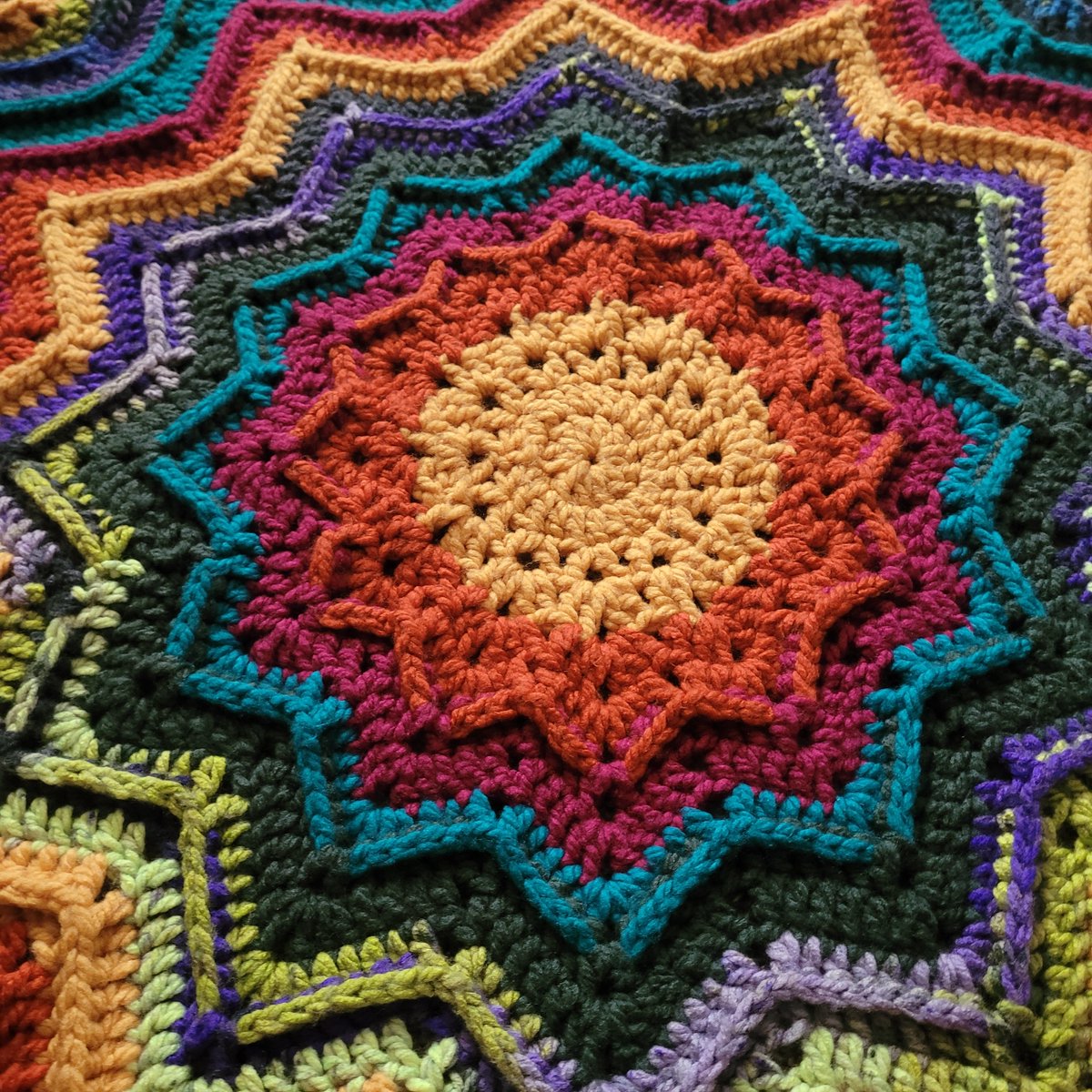 Novasbutt's tweet photo. So close to finally finishing this damn blanket. Only a few more rows, weaving in the ends and then giving it a good soak in some conditioner water https://t.co/u4GMYn9QCZ