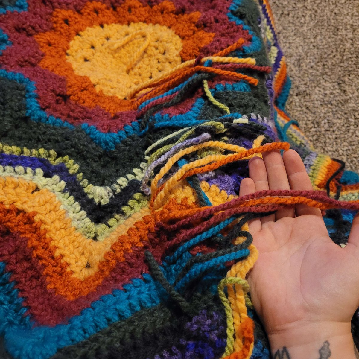 Novasbutt's tweet photo. So close to finally finishing this damn blanket. Only a few more rows, weaving in the ends and then giving it a good soak in some conditioner water https://t.co/u4GMYn9QCZ