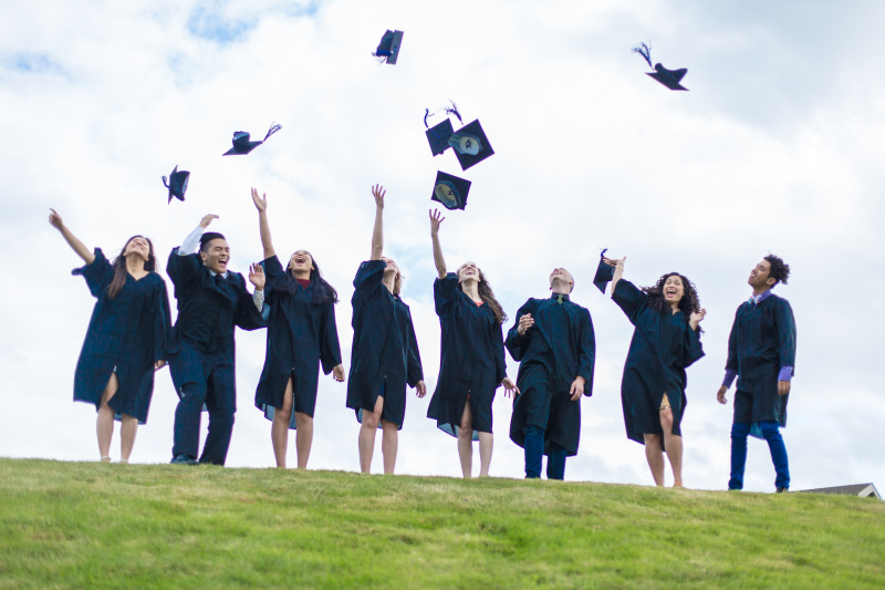 MadLarzi's tweet photo. My cap u0026 gown, a final group huddle, and a future full of unknowns—graduation hits different. https://t.co/Yl4CUPQYf3