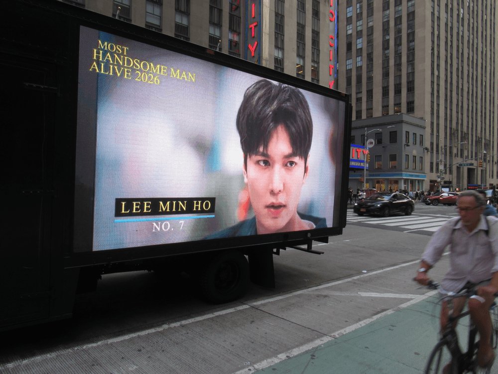 thenreport's tweet photo. Lee Min Ho ranks No. 7 among the Top 10 Most Handsome Men Alive 2026 — celebrated with a Times Square truck parade.

#netizenschoice magazine #MHMA2026 #TimesSquare

GET THE MAGAZINE: https://t.co/CTltmz6aVJ https://t.co/vgzwwLXy0k